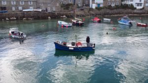 Muddy on the Aquila in Mousehole harbour
